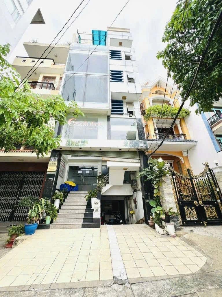 BÁN TOÀ NHÀ VĂN PHÒNG PHÚ NHUẬN- DTHU 80TRIỆU/THÁNG - DT 90M2(6mX15m)- 7 TẦNG HẦM - THANG MÁY - GIÁ - Ảnh chính
