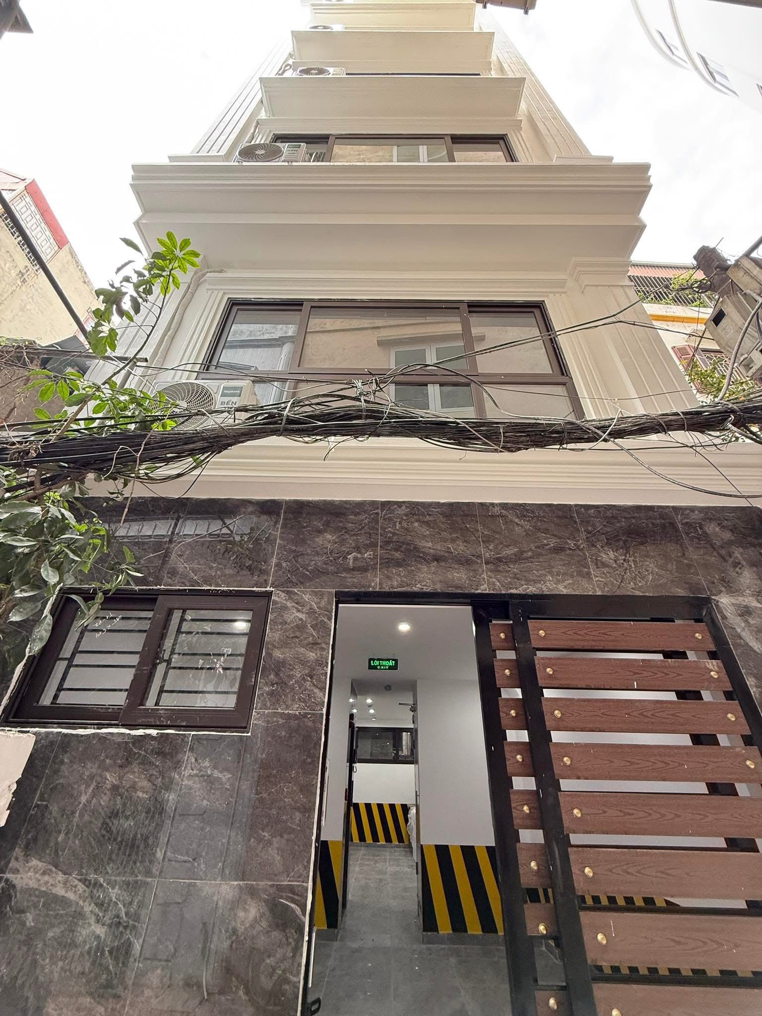 Bán Tòa Dòng Tiền Phố Thái Hà 51m2/ 7T Thang máy, MT 4.6m 18.6 Tỷ. Cách Phố 10m - Ảnh chính