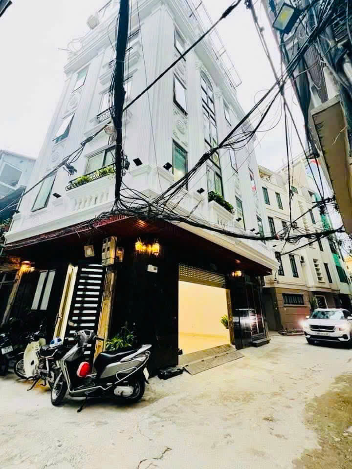 Bán nhà 6 tầng đường Láng, Q. Đống Đa, lô góc, 3 thoáng, ngõ thông, ô tô vào nhà, 46m2, MT 5.5m, - Ảnh 1