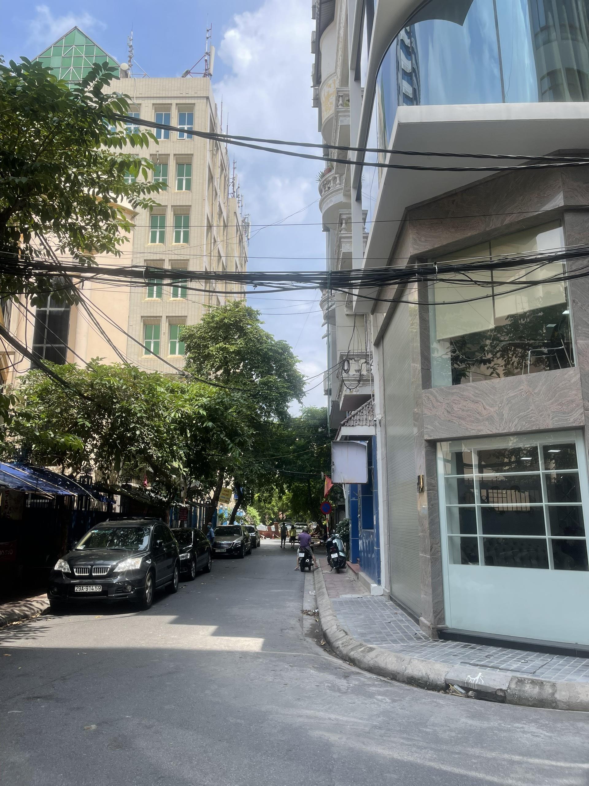 Bán nhà 7 tầng thang máy phố Thái Hà, Đống Đa 60m2 mặt tiền 5.4m Gara ô tô kinh doanh - Ảnh chính